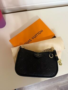 Louis Vuitton Black Mini Pochette with Gold Hardware